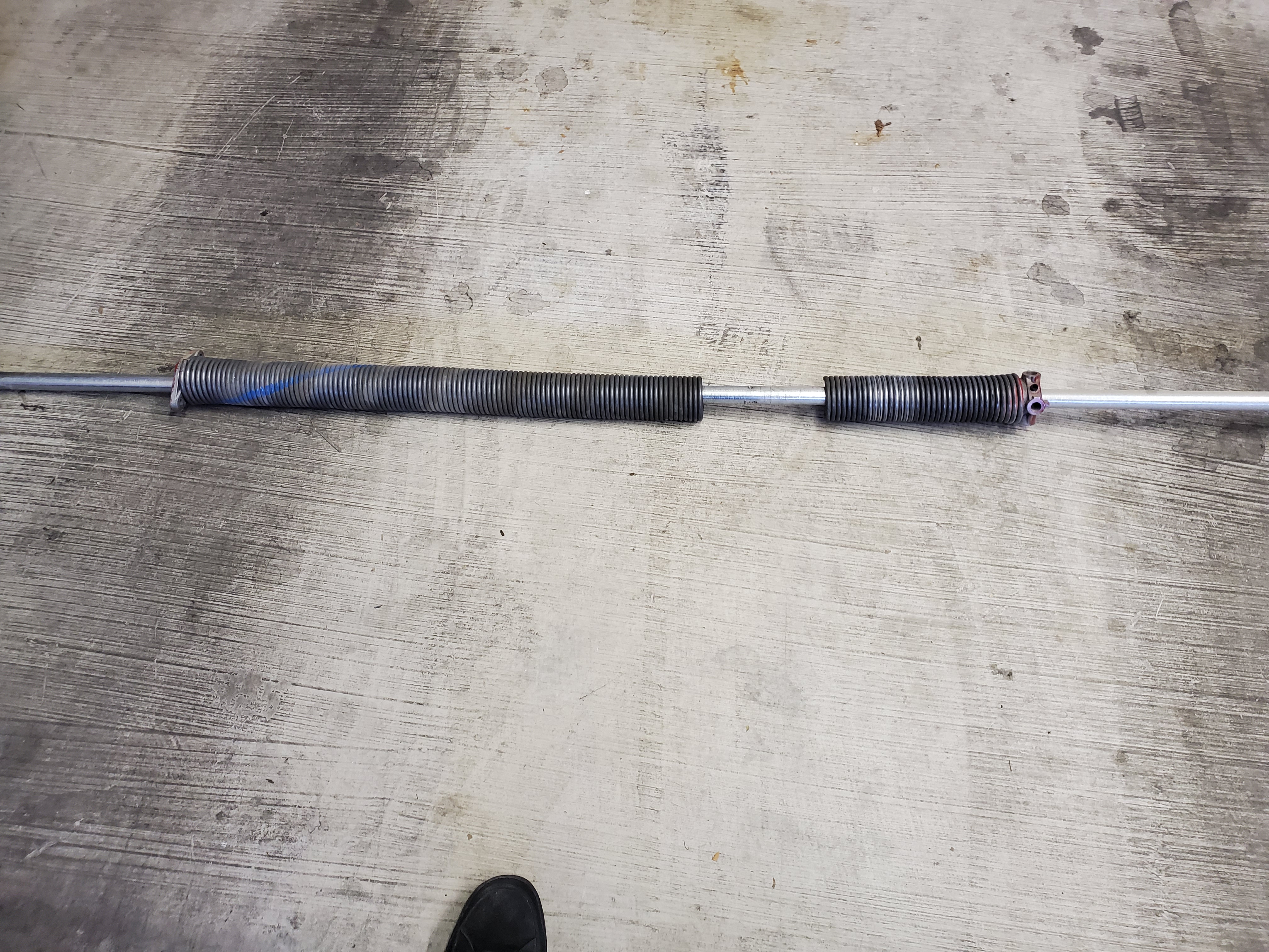 Broken garage door torsion springs replacement